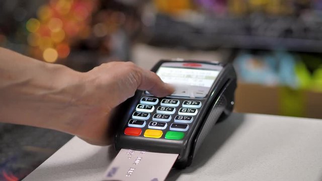 The buyer pays for the product through the cashless payment terminal