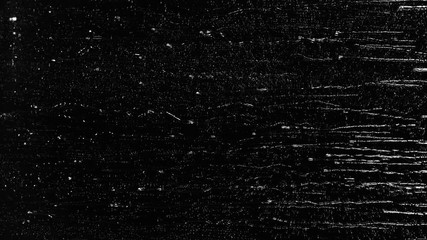 Rain water droplets slowly trickling down the window pane at night