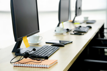 Chairs computers and headset call center in modern office