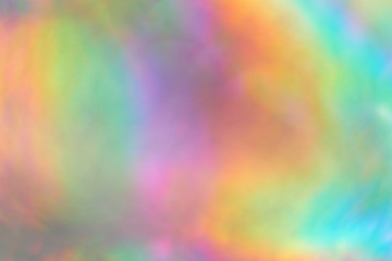 Color neon gradient. abstract blurred background. silver paper with a holographic effect. close up...