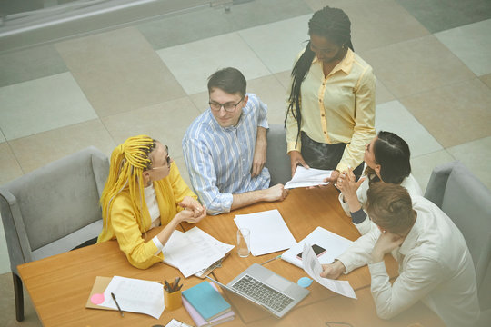 Brainstorming Process In A Small Start Up Company, Top View Photo.