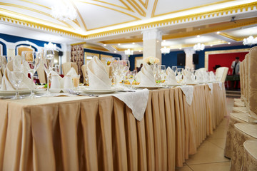 a table set in the restaurant, food and drink, master of ceremonies on a stage