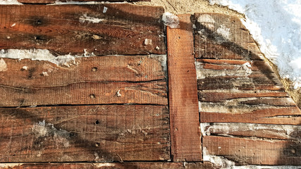 old wood floor texture with cold temperature at the outside in Cappadocia, Turkey. Vintage filter effect for retro style road with snow in Turkey