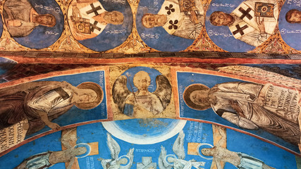 Ortodox christian frescos inside Dark church in Cappadocia. Ancient cave church with unique paintings in Goreme in Cappadocia