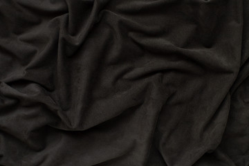 dark brown, olive suede fabric texture. waves on the surface of the fabric. Background, Wallpaper.