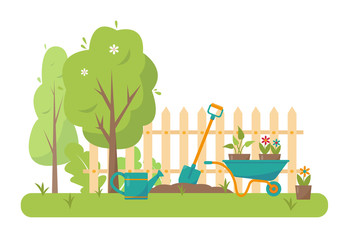 Gardening tools and trees in garden.