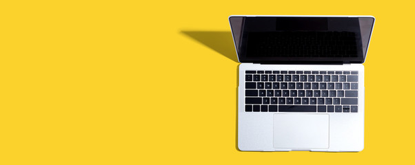 Laptop computer with drop shadow from above