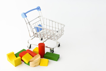 Coloring wooden toys with small shopping trolley or online chart on the white background
