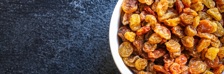 raisins, delicious dried grapes (fresh fruit vitamins) menu concept background. top view. copy space for text