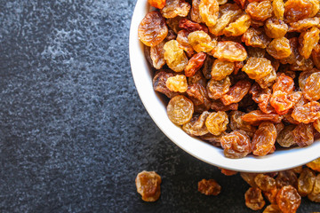 raisins, delicious dried grapes (fresh fruit vitamins) menu concept background. top view. copy space for text