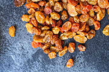 raisins, delicious dried grapes (fresh fruit vitamins) menu concept background. top view. copy space for text