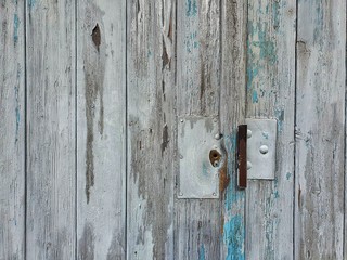 old wooden door with a lock