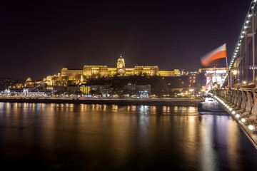 Fototapeta na wymiar Buda Castle, Royal Palace by the Danube river illuminated at night in Budapest