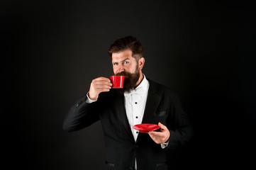 Man bearded hipster drinking coffee. Drinking coffee. Businessman enjoy coffee break. Relax...