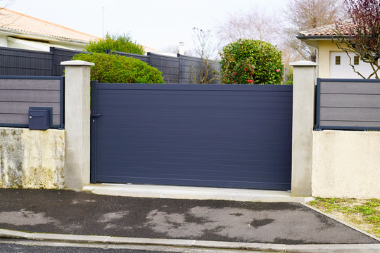 Aluminum grey metal gate of suburb house