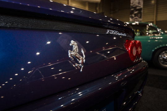 MAASTRICHT, NETHERLANDS - JANUARY 08, 2015: Fragment of a sports car Ferrari F355 Berlinetta. Rear view. International Exhibition InterClassics & Topmobiel 2015