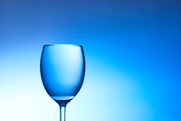 Water in glass on background.