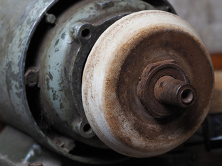 Close-up of an old grinding machine for finishing and processing metal. Industrial tool