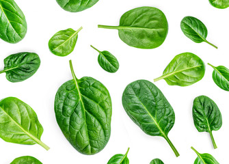 Spinach Pattern. Creative layout made of spinach leaves isolated on white background. Flat lay. Healthy Food concept.