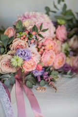 Wedding rings with wedding bouquet