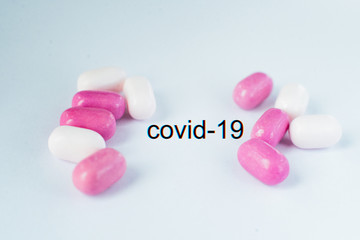 Colored pills close-up. Coronavirus vaccine concept macro