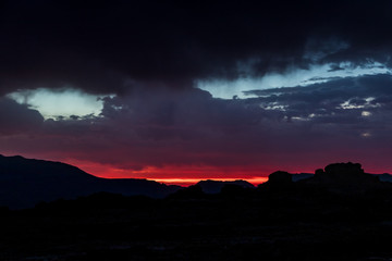 Sunset face in the clouds