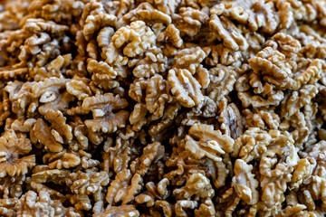 Walnuts shelled. Peeled raw walnuts. Fresh organic nuts. Raw nuts.  Walnuts as a food background.