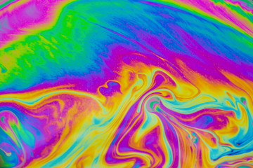 Psychedelic abstract background. Photo macro shot with light interference on the surface of a soap bubble