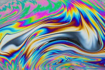 Psychedelic multicolored patterns background. Photo macro shot of soap bubbles