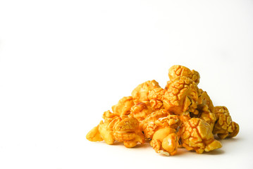 Caramel pop corn on white background