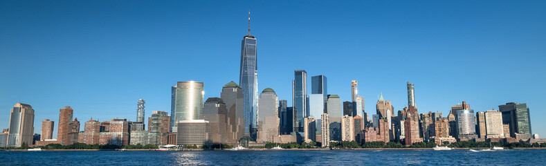 Fototapeta na wymiar Buildings and skyscrapers of the Manhattan urban skyline over the Hudson river in New York USA