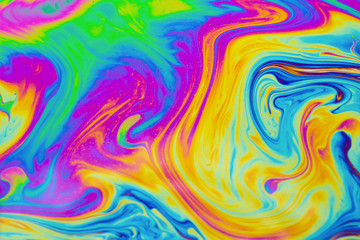 Psychedelic multicolored patterns background. Photo macro shot of soap bubbles