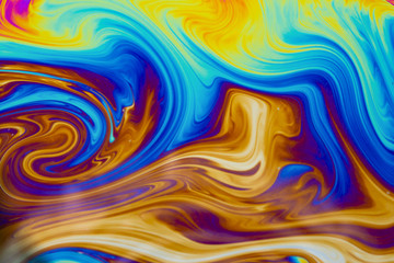 Psychedelic multicolored patterns background. Photo macro shot of soap bubbles