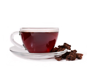 The cup of the chinese puer tea isolated on a white background.