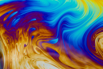 Psychedelic multicolored patterns background. Photo macro shot of soap bubbles