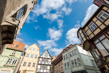 Fototapeta na wymiar Old half-timbered houses in Quedlinburg, Germany on sunny day with clouds