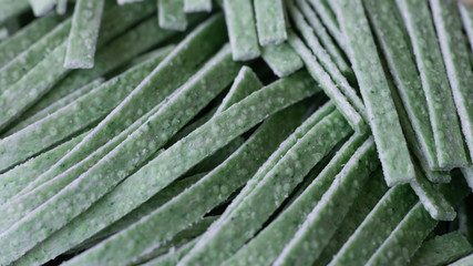 Fototapeta premium green healthy egg noodles close-up