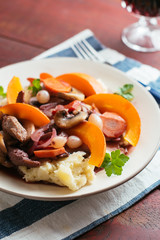 Squash au vin with TVP  pieces over mashed Potatoes