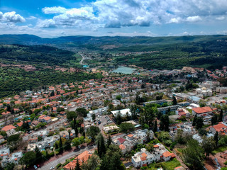 Aerial view of Maalot , Israel with water and communication tower in sight 