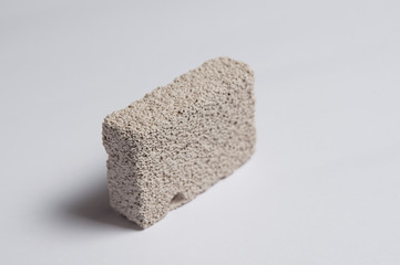 Gray pumice for the care of rough skin. Personal care