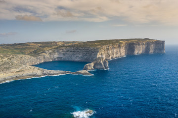 Aerial view of Sea Tunnel near Azure window. Dwejra is a lagoon of seawater on the Gozo island.Malta