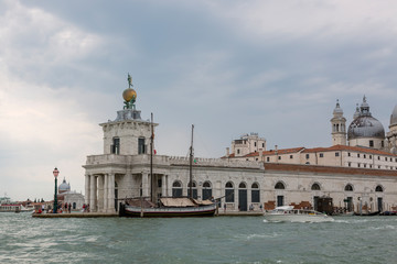 Fototapeta na wymiar Punta della Dogana - the art museum of Venice, the place where the Grand Canal meets the Canal of Judecca