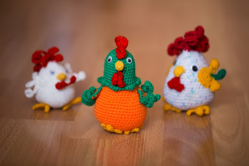 Symbol of the year 2017, the year of the rooster. Knitted cock, isolate. Textile decoration for interior design or Christmas tree. Perfect for a gift.