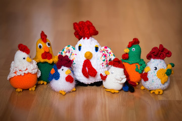 Fototapeta premium Symbol of the year 2017, the year of the rooster. Knitted cock, isolate. Textile decoration for interior design or Christmas tree. Perfect for a gift.