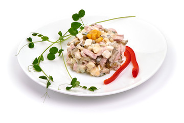 Russian traditional salad olivier, isolated on white background