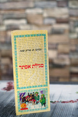 The Book of Esther, also known in Hebrew as "the Scroll" (Megillah), is a book in the third section of the Jewish Torha. Purim A jewish holiday.