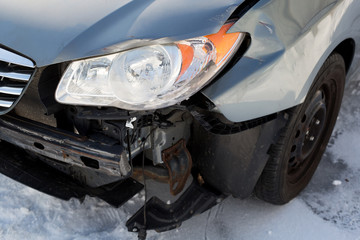 Sheet metal damage to blue car. Traffic Accident