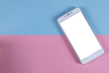 white smart phone on the color table