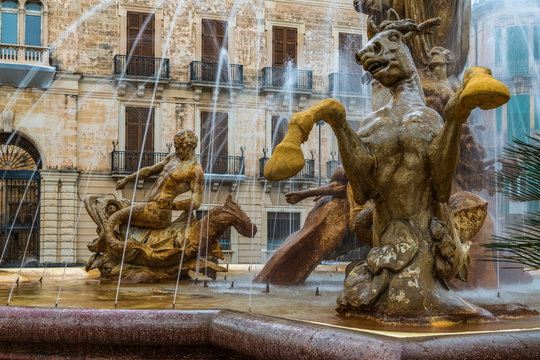 Close view of the sculpture of horse, as part of the fountain Diana in the center of the square Archimede in Ortigia island in province of Syracuse in Sicily