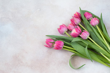 bouquet of pink tulips on the table 